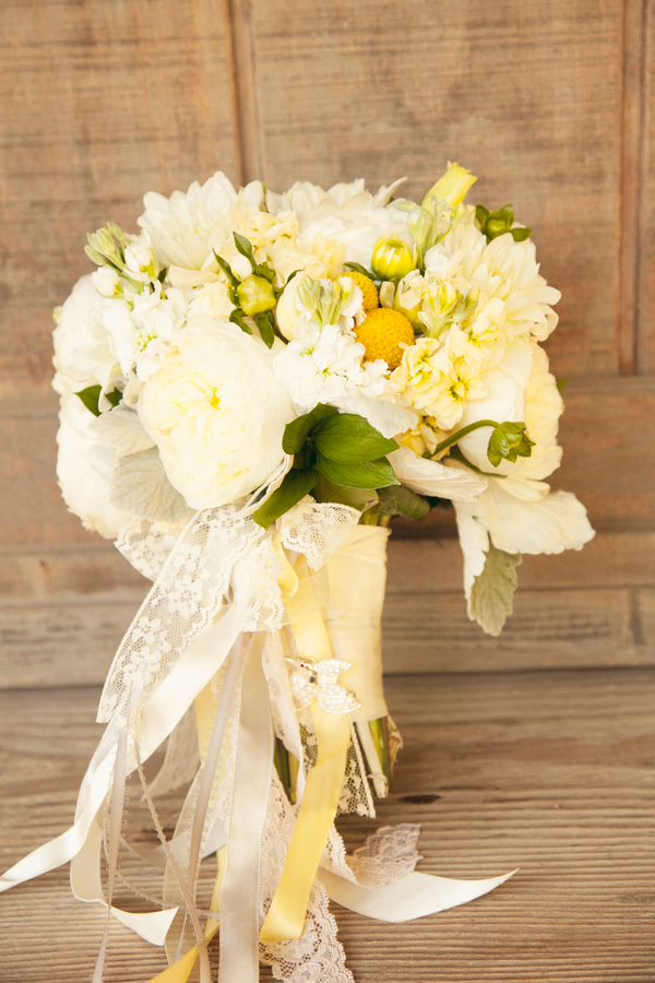 Wedding Photo by Christine Bentley Photography of Yellow and White bouquet with lace and ribbon
